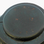 The maker's IS stamped into the metal plate