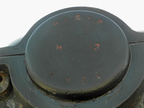 The maker's IS stamped into the metal plate