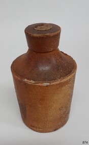 Two tone brown stoneware ink bottle with seal in place