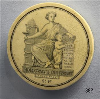 Cream coloured ceramic lid with Trade Mark; image of adult and child and text