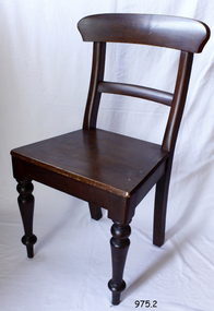 Dark brown wooden chair with curved back and flat seat