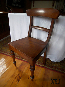 Timber chair with plain seat and slightly curved backrest, turned legs 