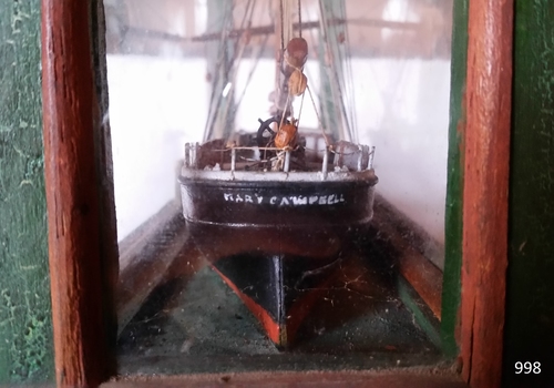 Stern of ship model with name of ship
