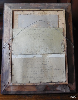 Inscriptions handwritten in ink on back with ship details, history, and presentation informaiton