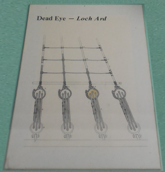 The illustration depicts a deadeye eye amongst the rigging of a vessel
