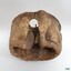 Wooden dead eye has split on the side of one hole, exposing the centre of the wood and showing the embedded nail