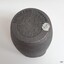 Round base has maker's details stamped into the material
