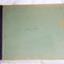 Large cardboard covered ledger book with printed columns and rows