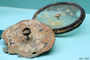 Brass disc with a metal pedestal, glass disc with a metal rim and central piece