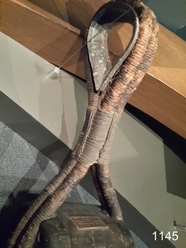 Block is well supported by its rope rigging