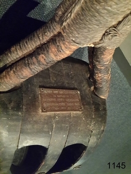Close-up of plaque and sheaves