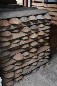 The Bond Store displays a large number of stacked ingots