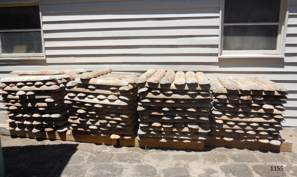 More stacks of ingots outside the Blacksmith's