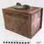 The metal rectangular box has a screw on lid and contains survival equipment