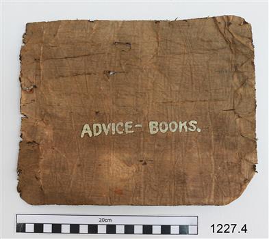 Thick fabric book with printed text on the cover