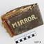Hard cover over fabric pouch for holding a mirror