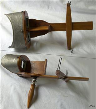 Wooden and metal stereoscopes with etched decoration on metal surfaces