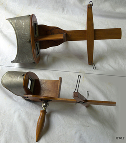 Wooden and metal stereoscopes with etched decoration on metal surfaces