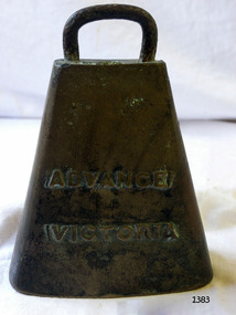 Inscription on wide side of bell is on view