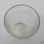 Inscriptions are embossed on the inside. Glass thickness is uneven and rippled.