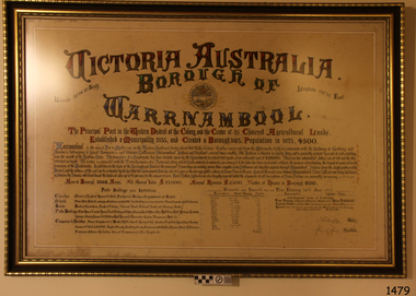 Framed certificate with decorative lettering and historic details