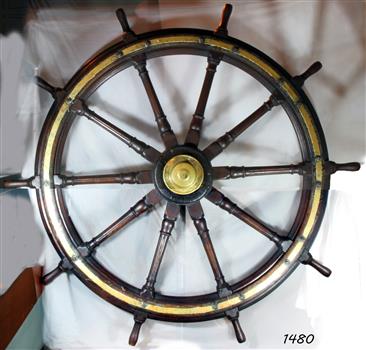 Wooden ship's wheel with brass fittings