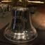 Inscription embossed on metal bell