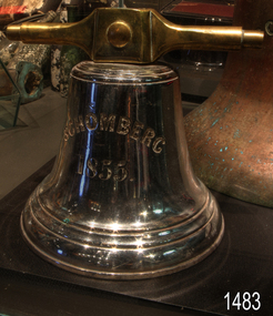 Inscription embossed on metal bell