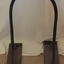 Stand is made of metal and wood