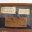Glass front timber display with wood sample and information cards