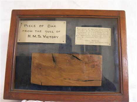 Glass front timber display with wood sample and information cards