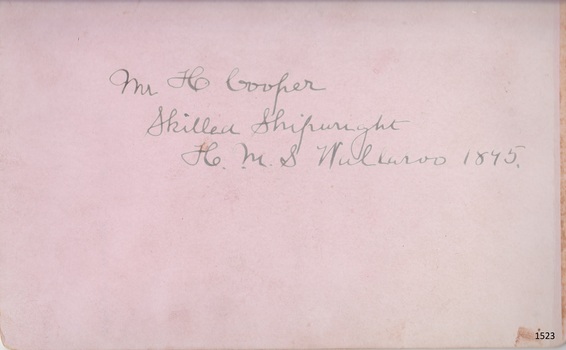 Handwritten message on the back of the postcard with details of the male in the photograph