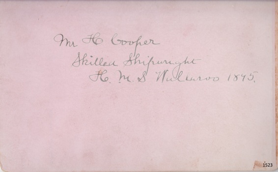 Handwritten message on the back of the postcard with details of the male in the photograph