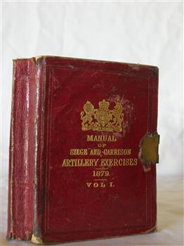 Small red hard covered book, embossed gold text and logo on front, brass clasp across opening