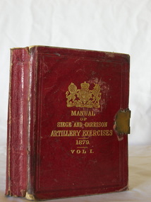 Small red hard covered book, embossed gold text and logo on front, brass clasp across opening