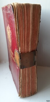 Hinged metal plate connects to front and back plates