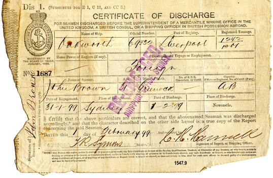 Certificate of Discharge with name of seaman, ship, date and other particulars filled in by hand with ink