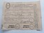 Certificate of Discharge with name of seaman, ship, date and other particulars filled in by hand with ink