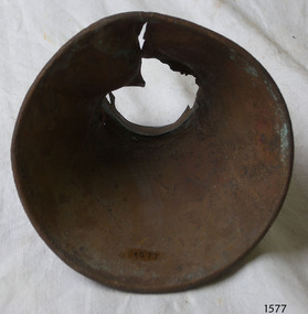 Metal tube, conical shaped opening, wide rim has a rolled edge. 