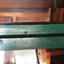 Inscription is embossed on the metal frame of the apparatus