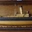 Wooden ship model in wood and glass case with decorate front frame