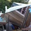 Boatbuilder restoring lifeboat's double planking