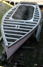 The viator, in the process of restoration, with the inside of the hull exposed. 