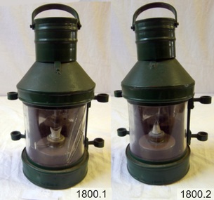 Two metal and glass cylindrical lamps, each with two metal guides on each side