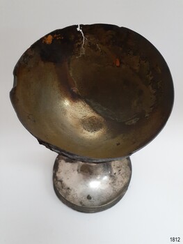Bowl's metal is split, encrusted and tarnished. Electroplate layer has peeled off
