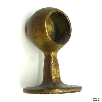 Brass is thick. There is a partial registration number visible within the sphere.