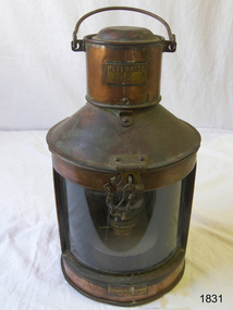 Side profile of lamp showing two nameplates