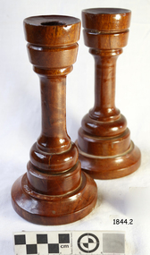 Turned wooden candlesticks, pair of two, with conical shaped bases