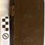 Black covered book with gold embossed text on the spine