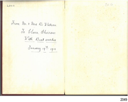 Handwritten presentation information about the giver and receiver